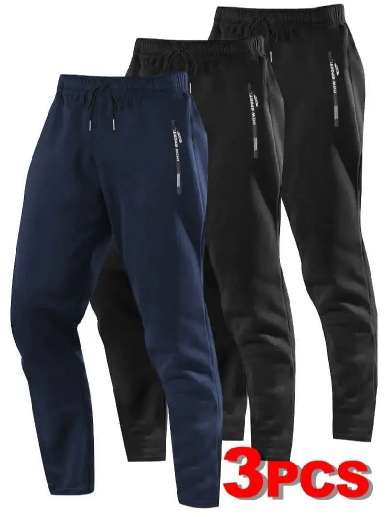 Zip Pockets Set of Three Solid Color Regular Fit Joggers Elastic Cuffs, Zip Pockets, Letter Prints, Drawstrings Suitable for Wor